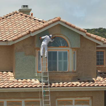 stucco home being repaired